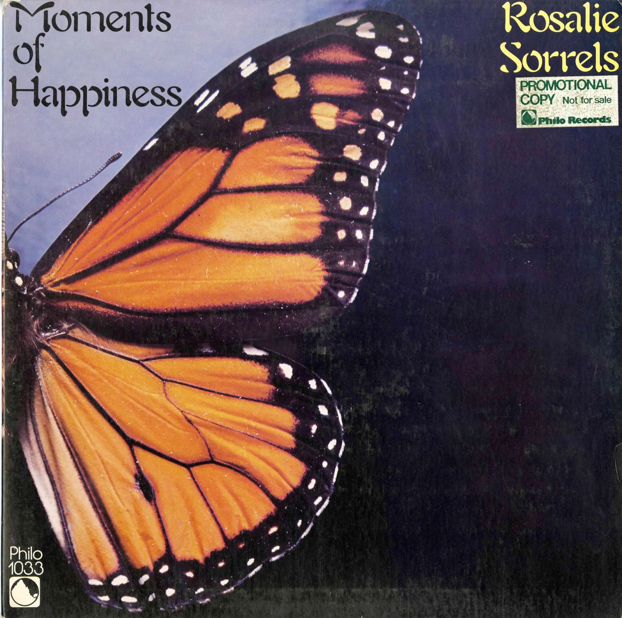 Butterfly on "Moments of Happiness" album cover.