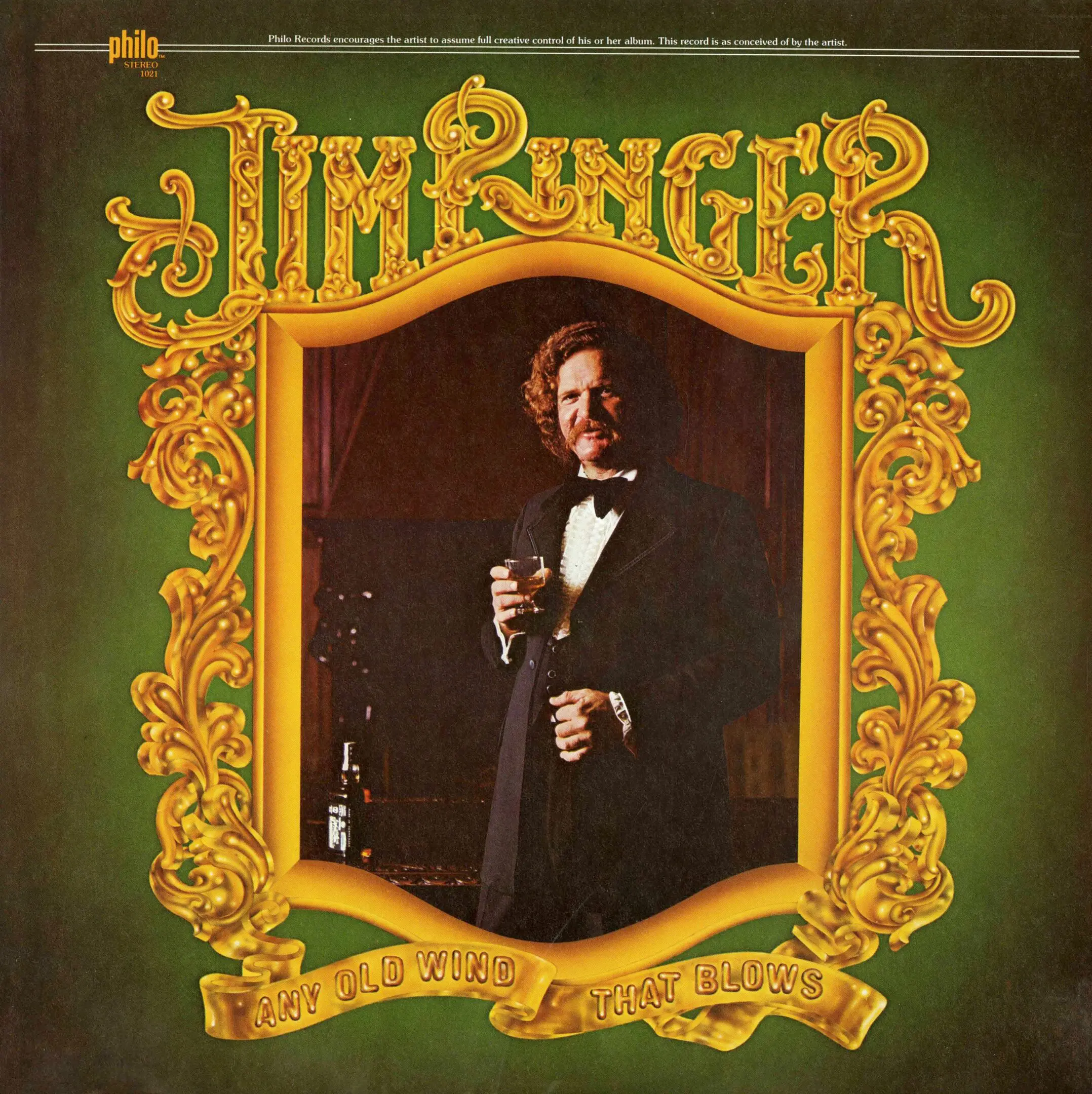 Vintage album cover with ornate gold frame.