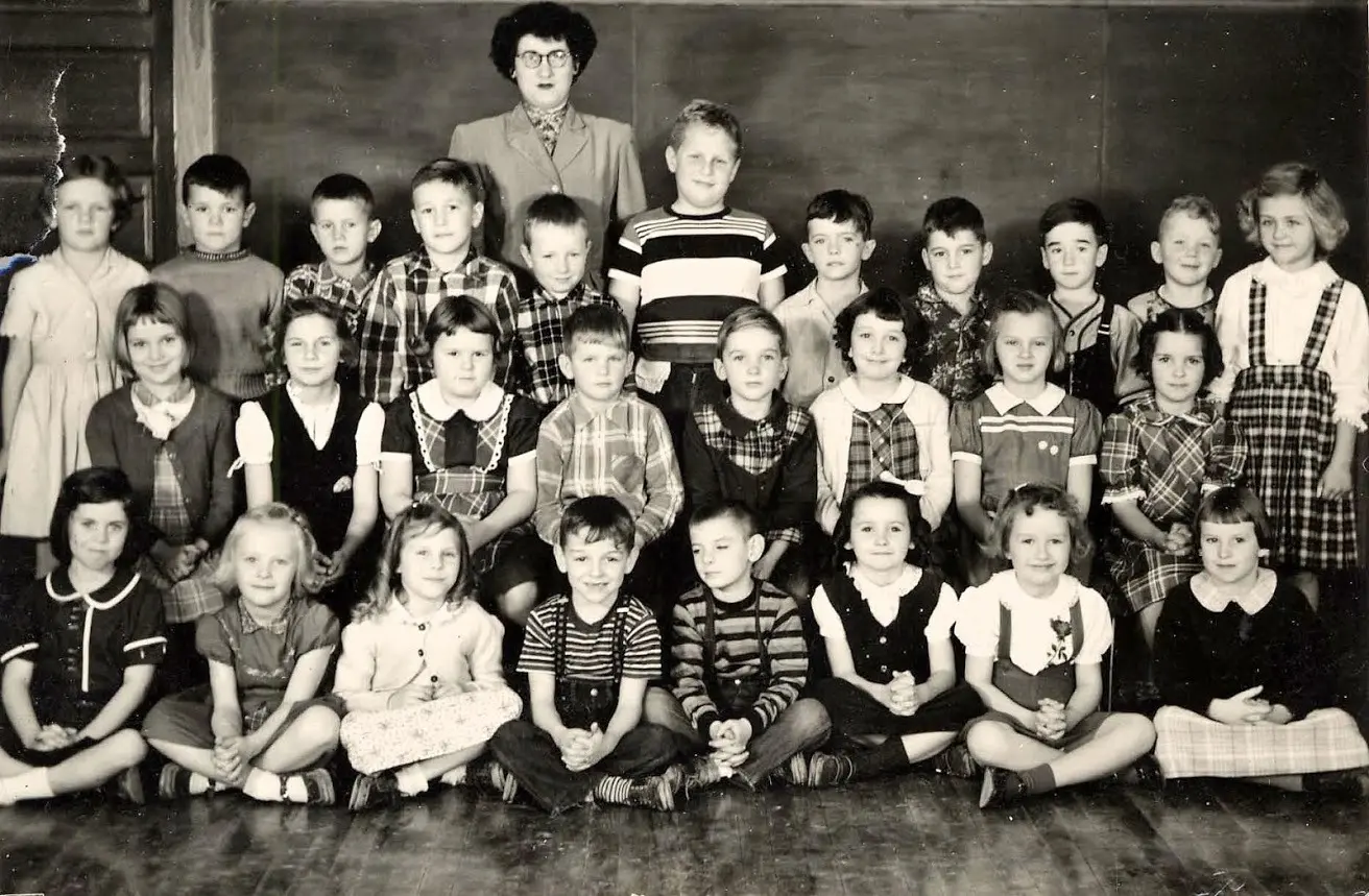 Vintage classroom group photo with teacher.
