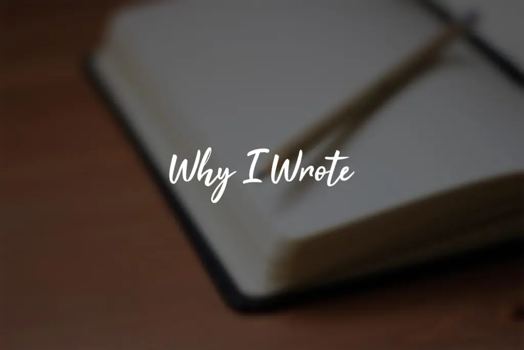 Open notebook with a pencil, "Why I Wrote".