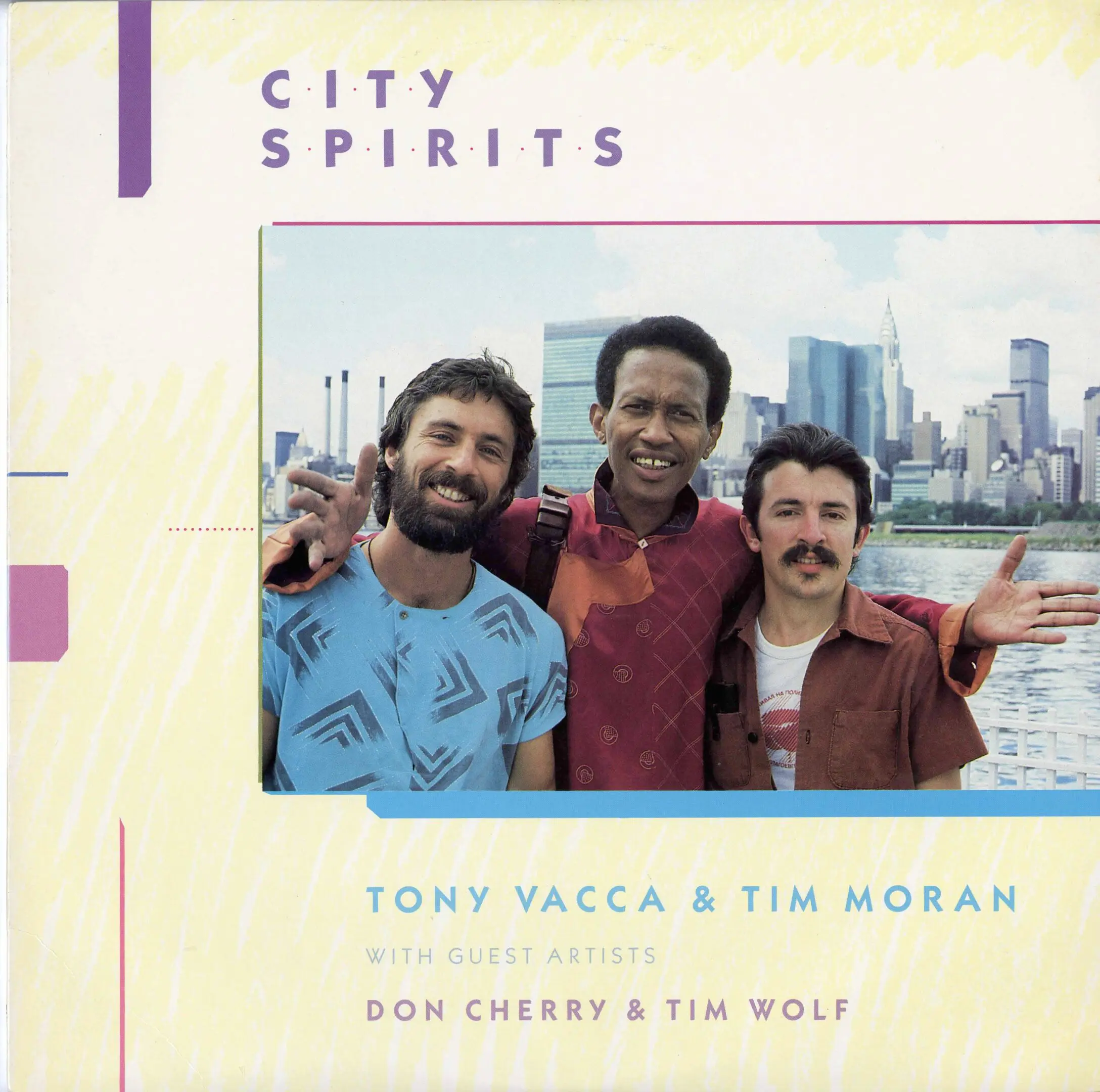 Three men posing with city skyline background.