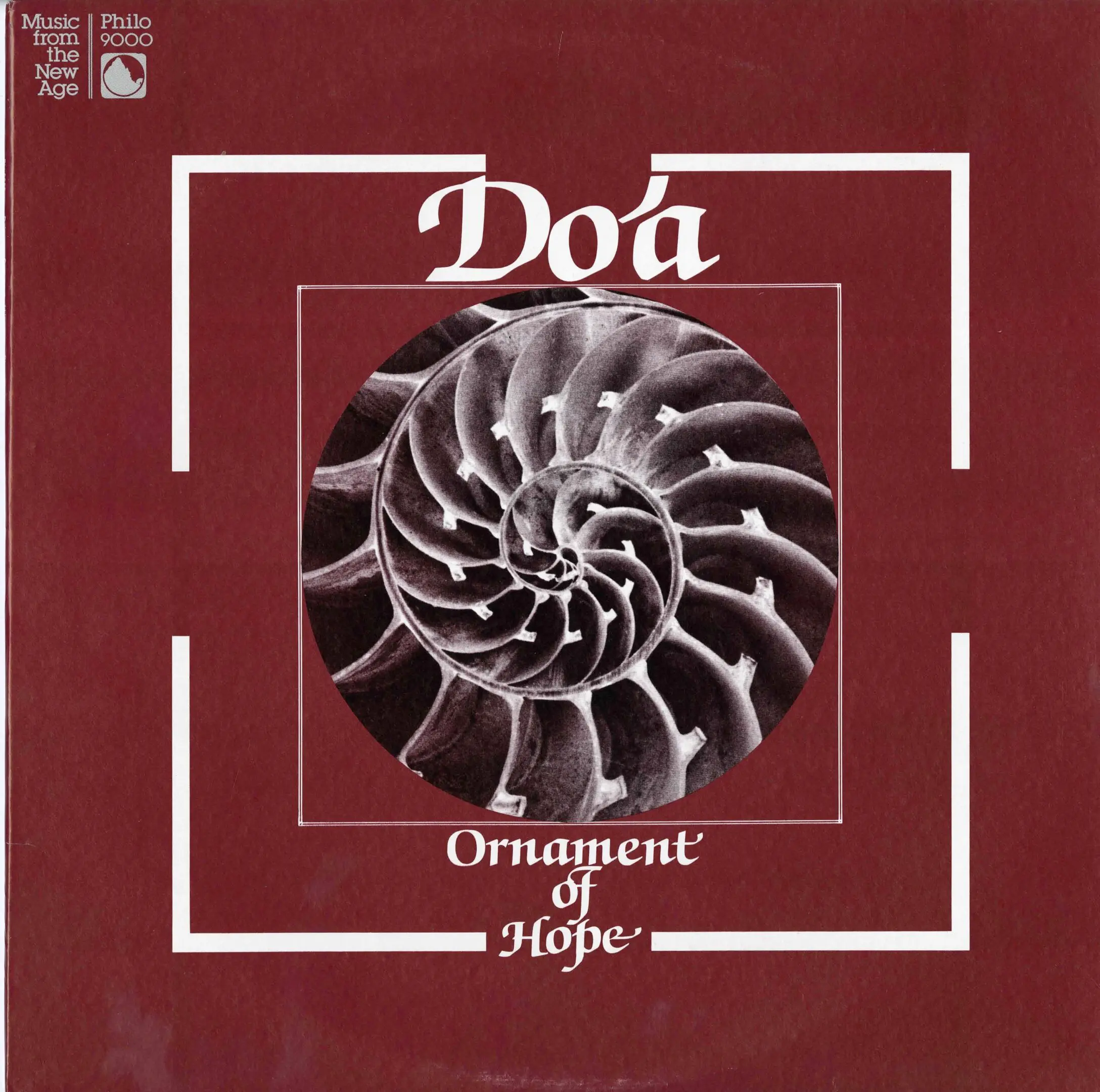 Red album cover with spiral shell design.