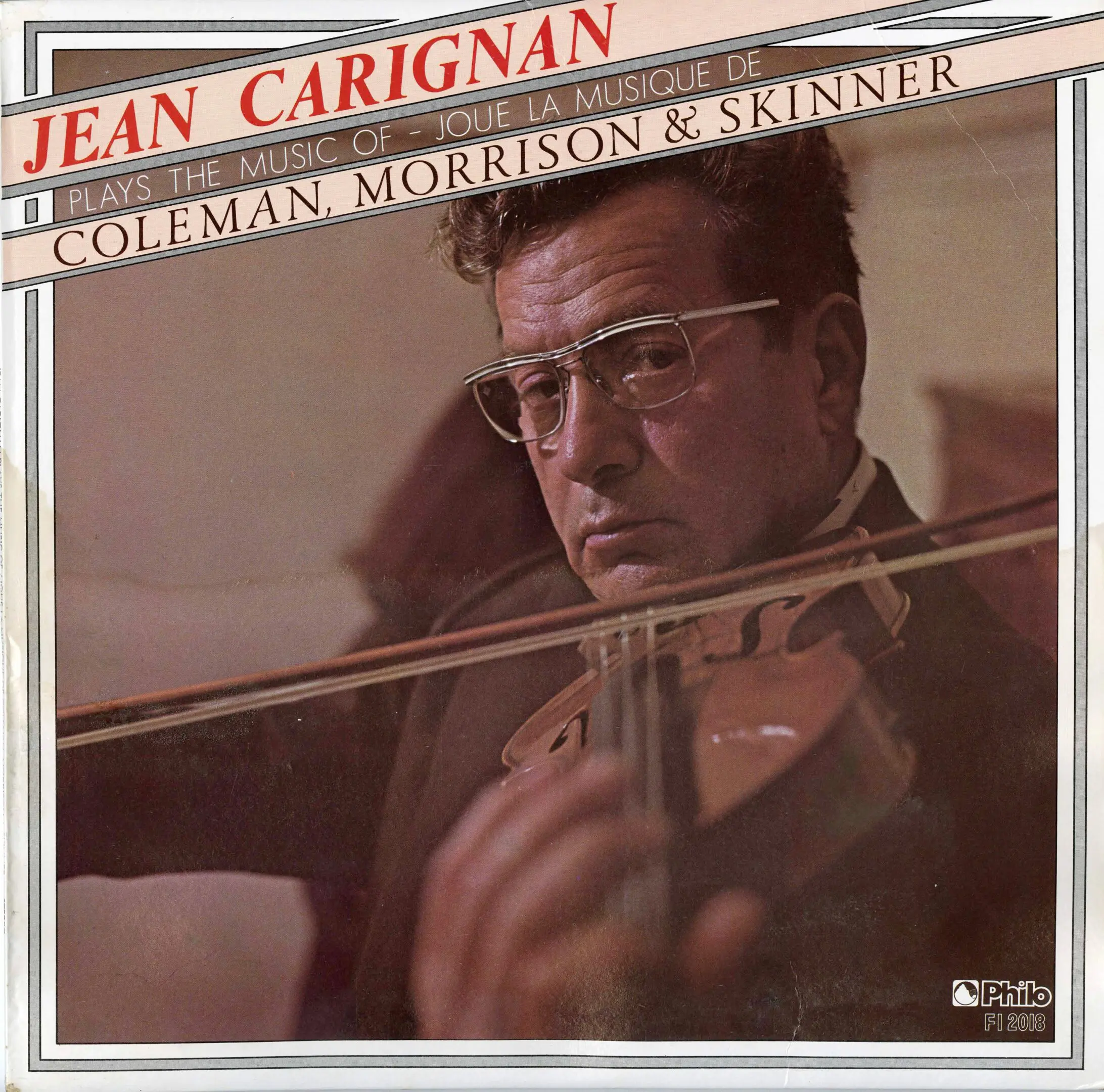 Man playing violin on album cover.