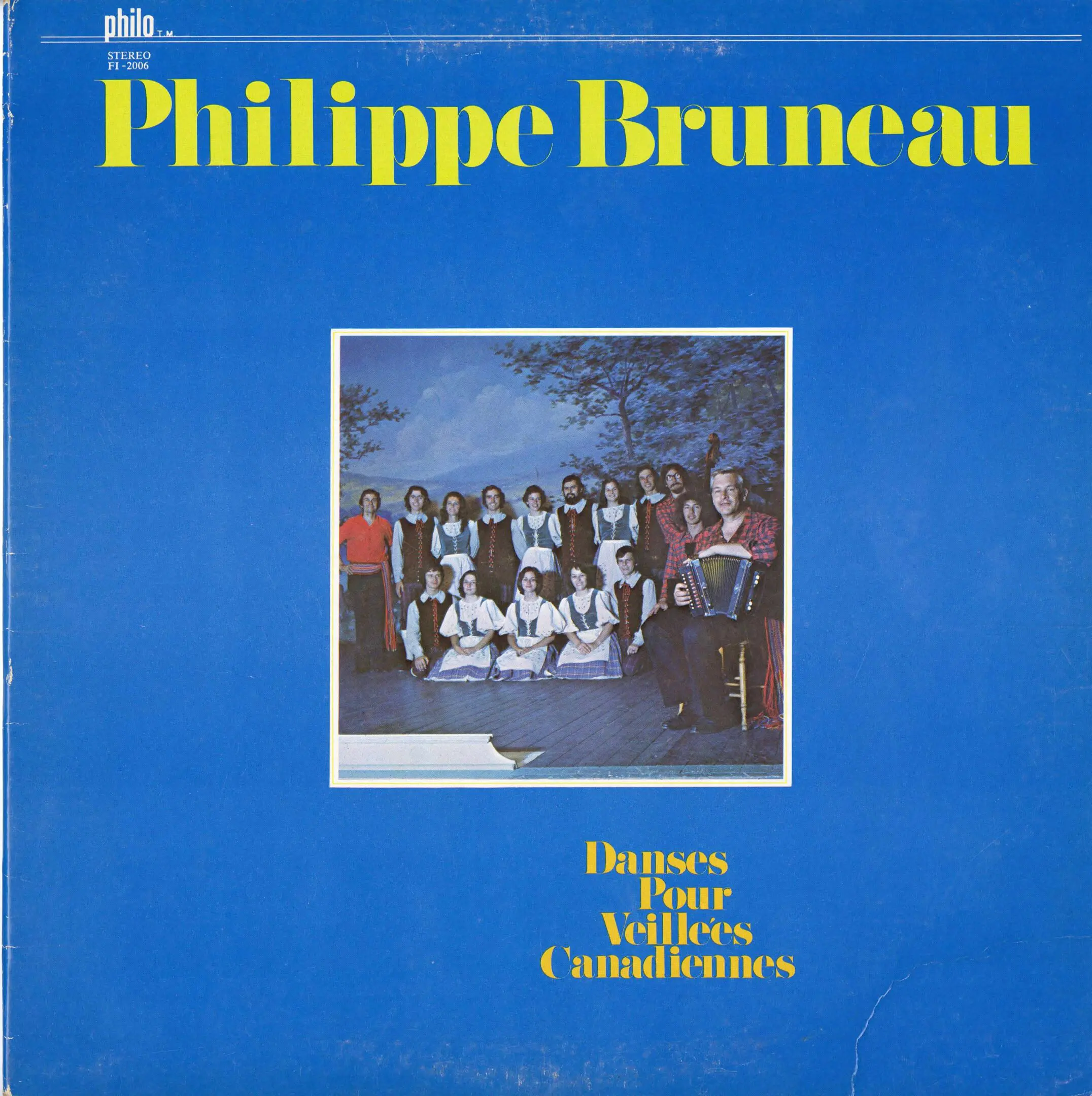 Blue album cover with group photo.