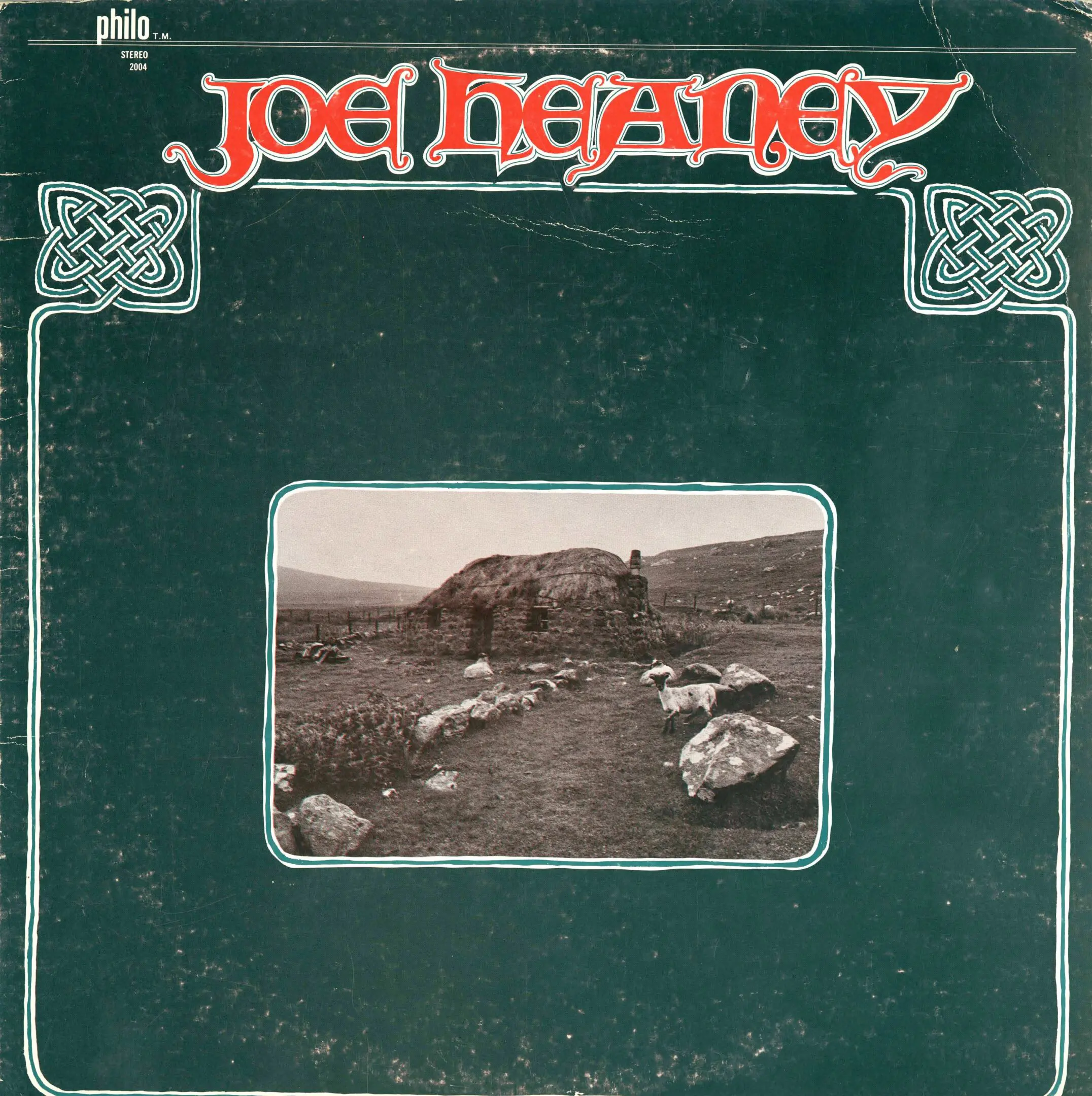 Album cover with landscape and decorative text.