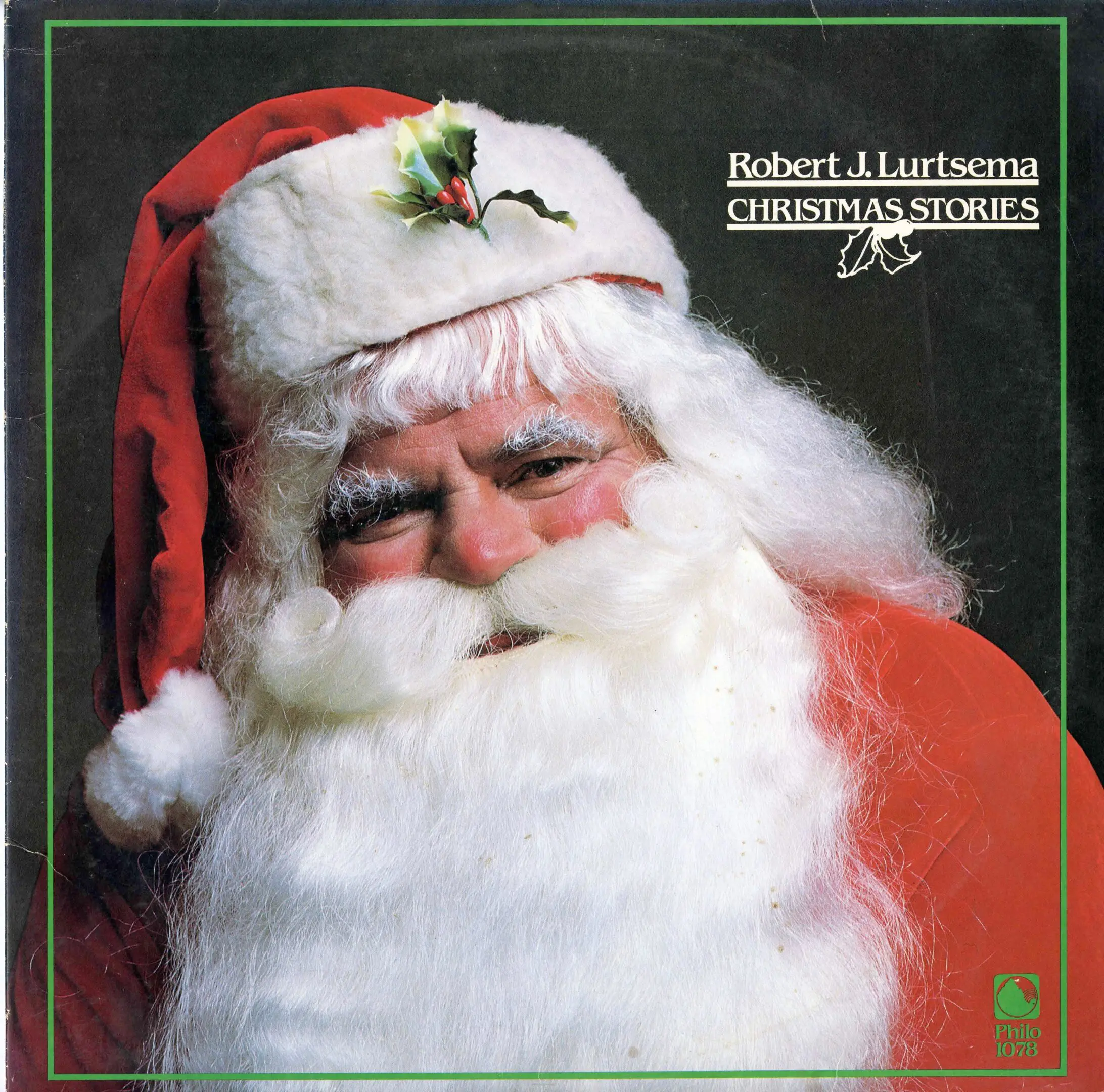 Santa Claus wearing a red hat smiling.