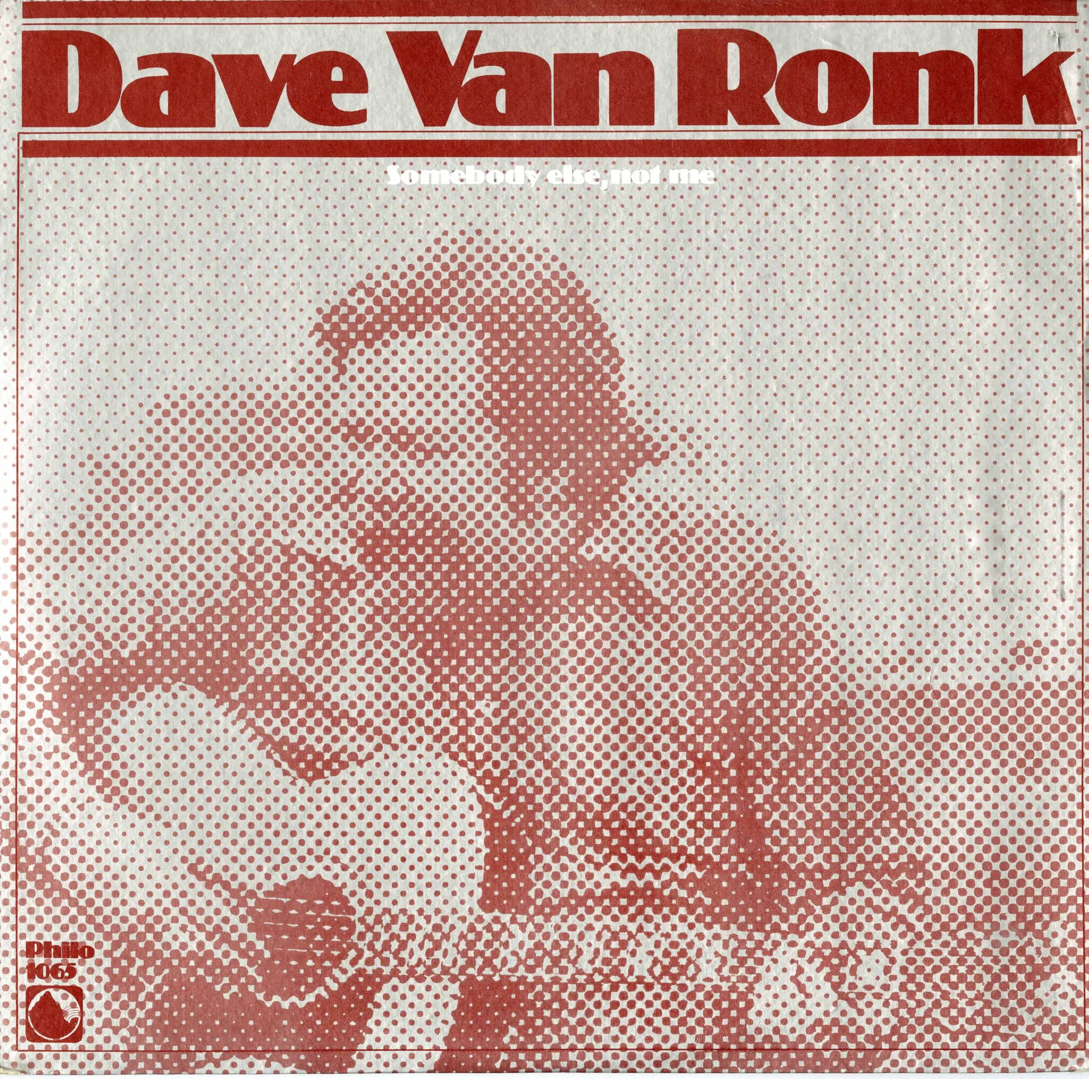 Man playing guitar on vintage album cover.