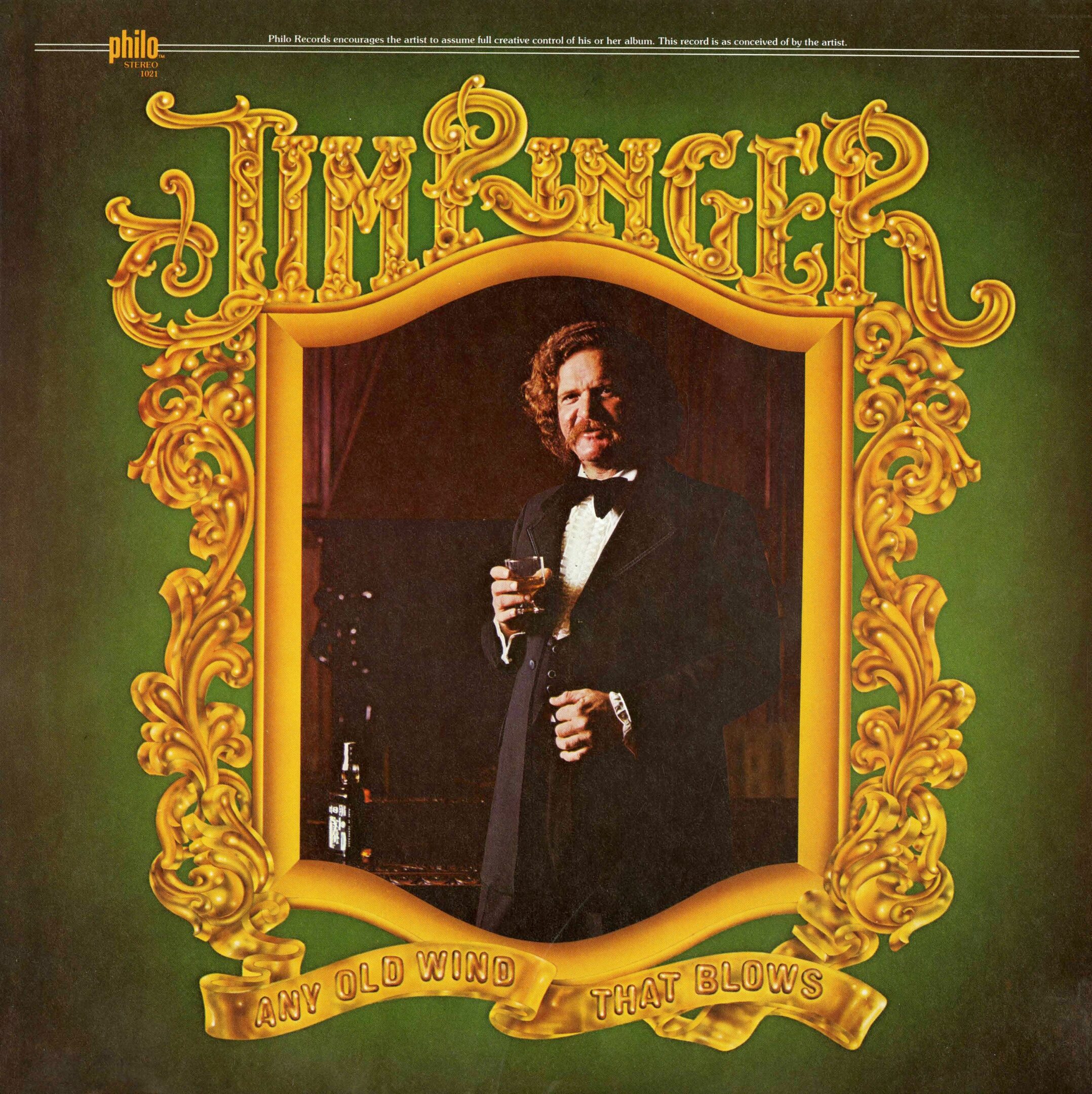 Vintage album cover with ornate gold frame.