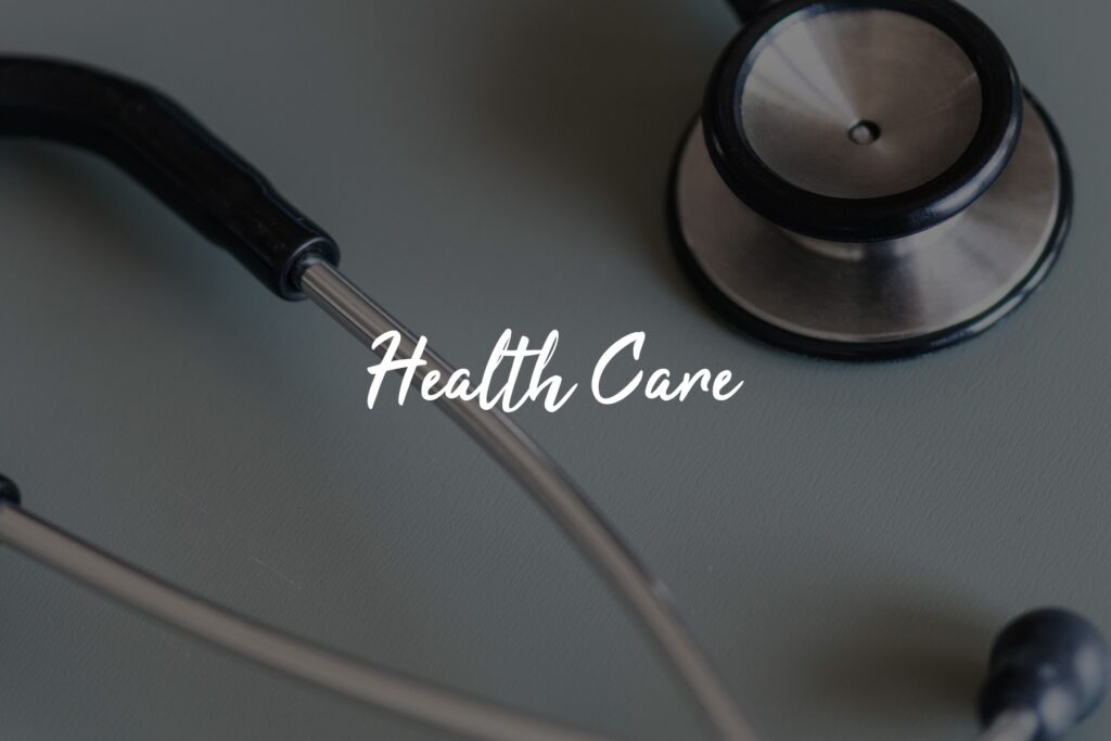 Stethoscope and "Health Care" text on surface.