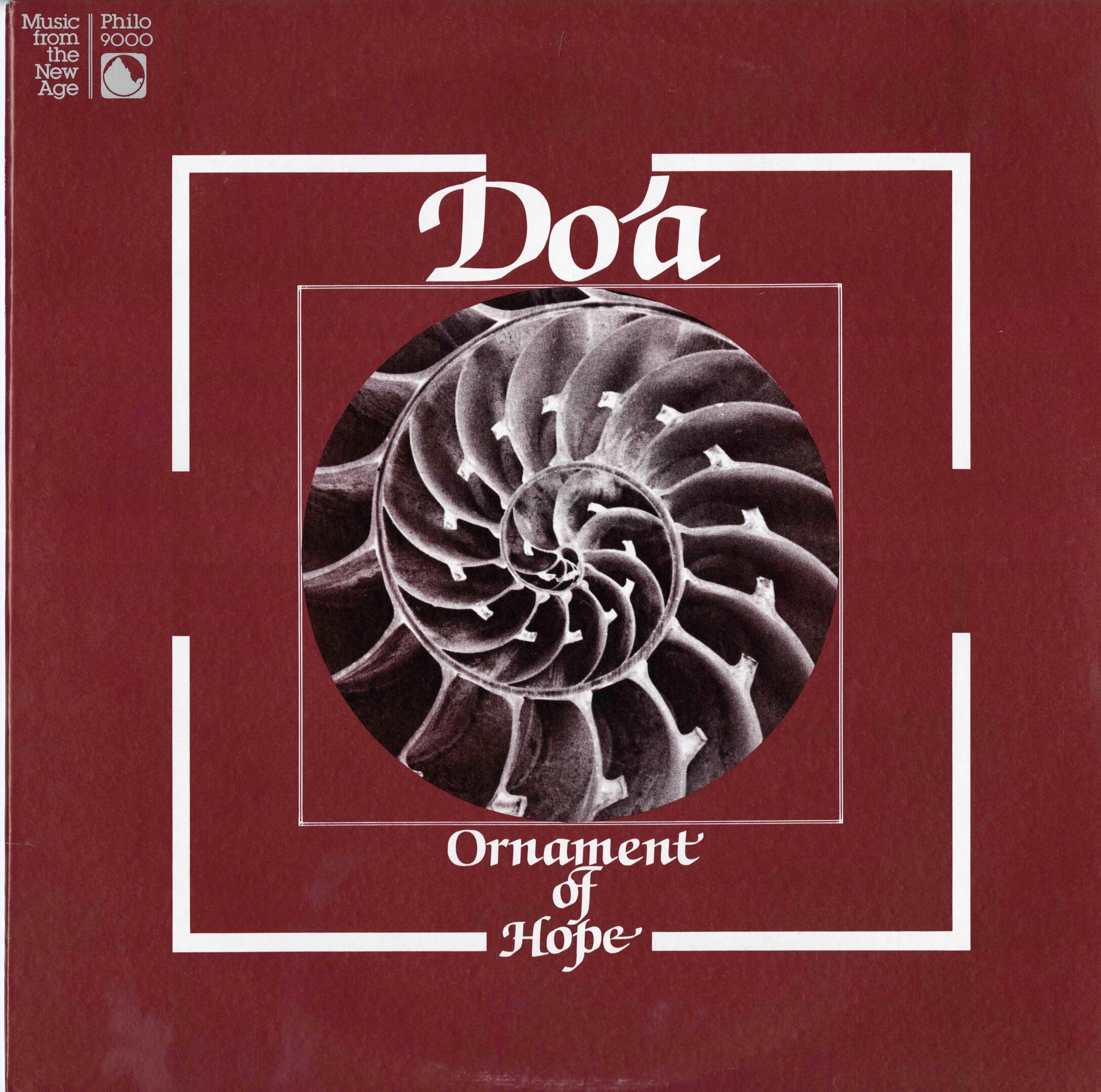 Red album cover with spiral shell design.