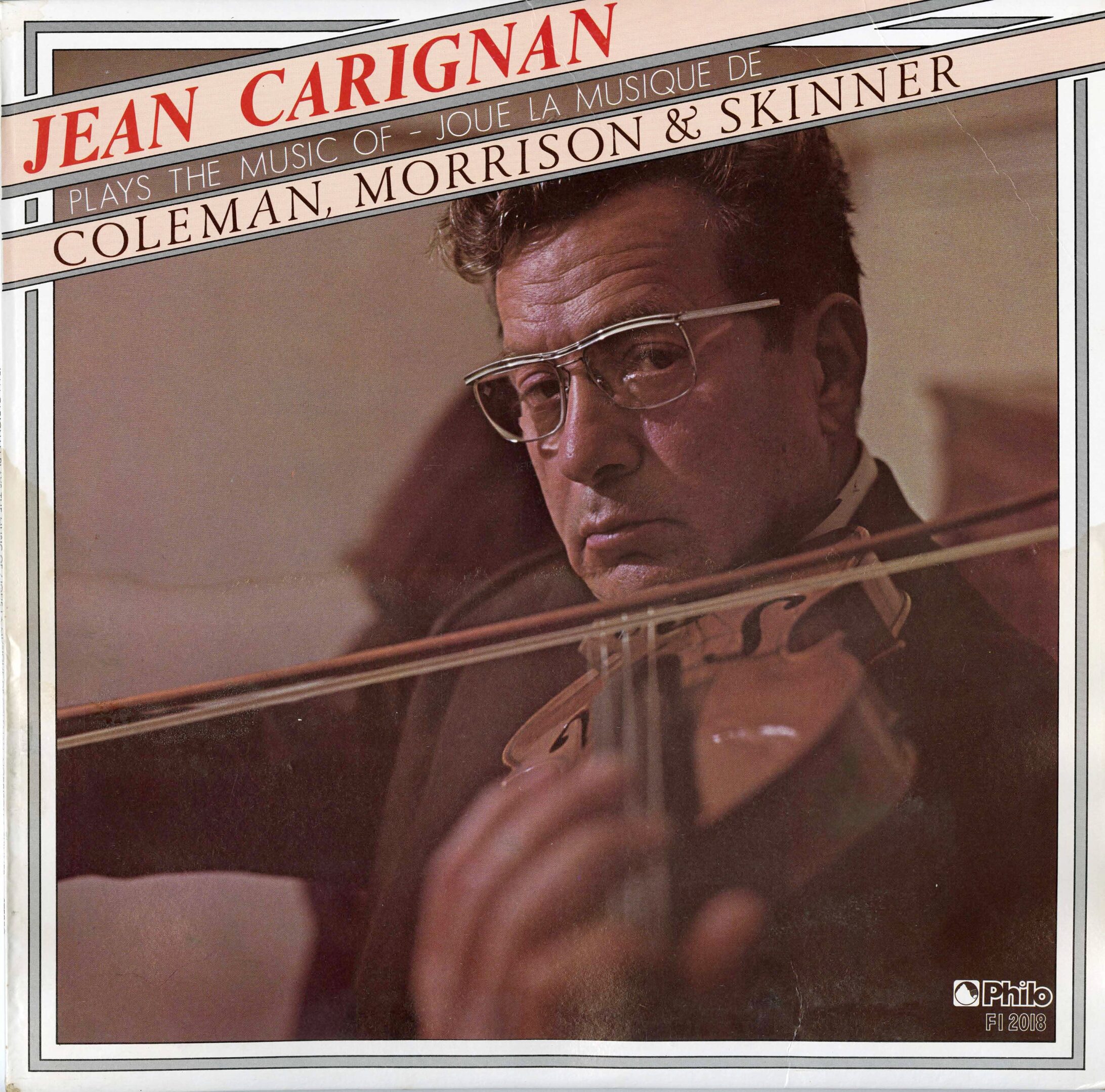 Man playing violin on album cover.