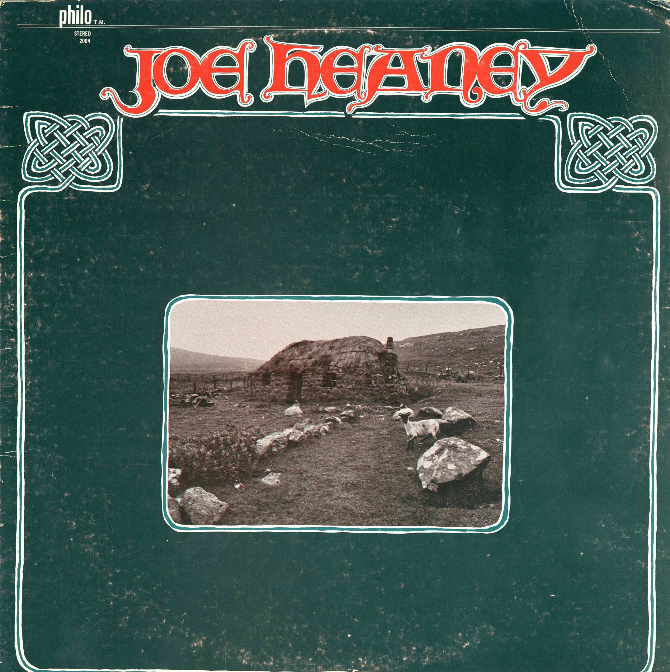 Album cover with landscape and decorative text.