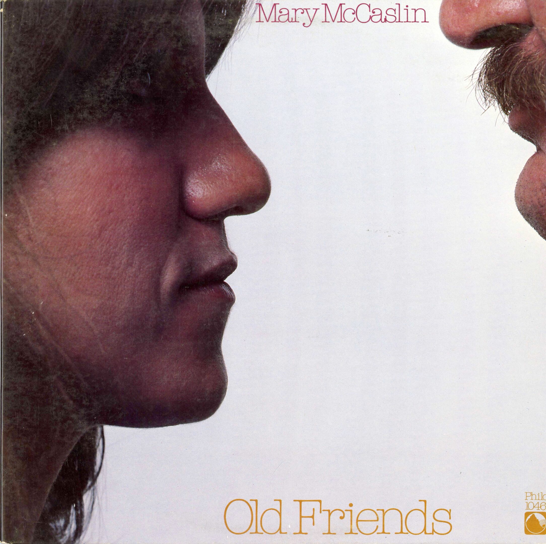 Profile of two people facing each other.