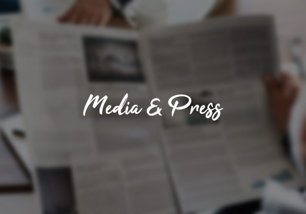 Blurry newspaper with "Media & Press" text. Blurry newspaper with "Media & Press" text.